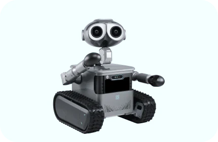 A compact wheeled robot with a distinctive dual-camera head featuring large circular eyes, articulated arms, and a tank-tread base, designed in a charming WALL-E-inspired aesthetic for home use.