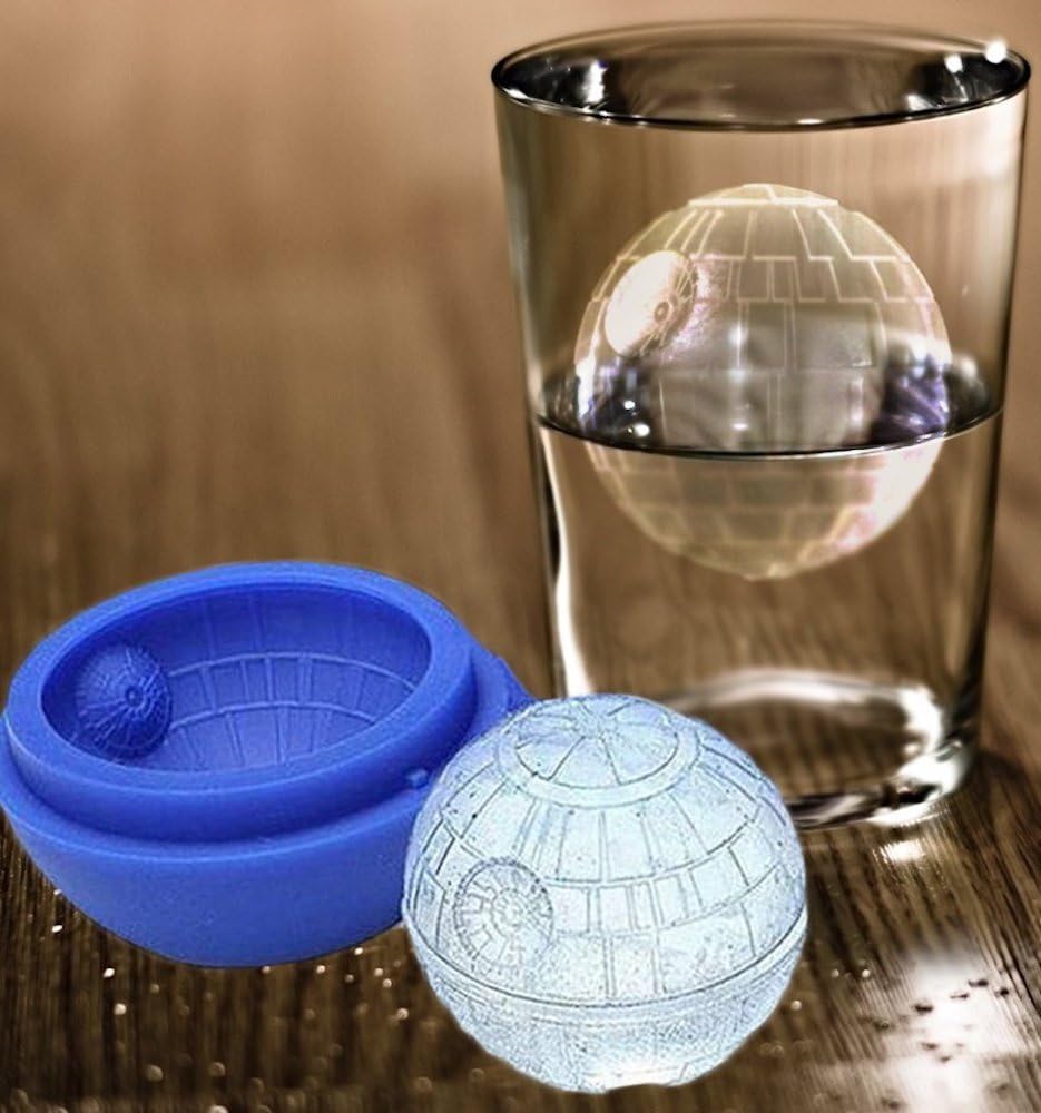 A silicone ice mold shaped like the Death Star from Star Wars, shown in blue alongside a finished clear ice sphere floating in a glass of water, creating a novelty ice cube for themed beverages.