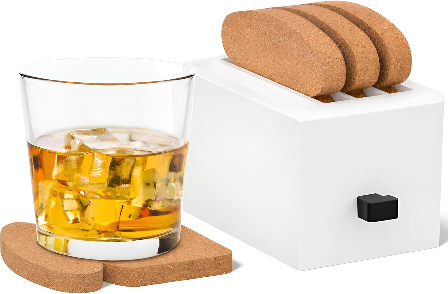 A modern white toaster-shaped holder with cork coasters, displayed alongside a glass of whiskey on a cork coaster and additional cork coasters stored in the toaster's slots.